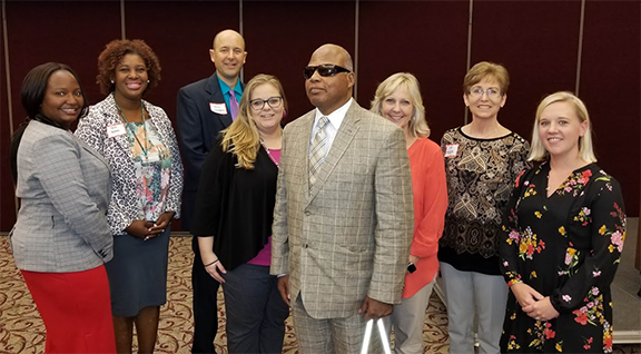 Raleigh Mayor’s Committee members and presenter Ashley Hayes Chassereau (in the middle), Community Employment Program Specialist at the NC Division of Vocational Rehabilitation Services