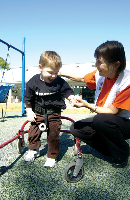 child and parent at playground