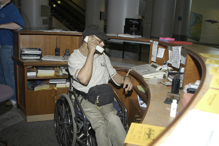 man answering phone