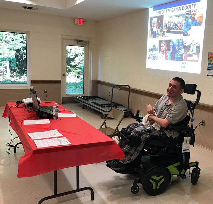 Bryan Dooley prepares to lead an ADA training on July 26th, 2019